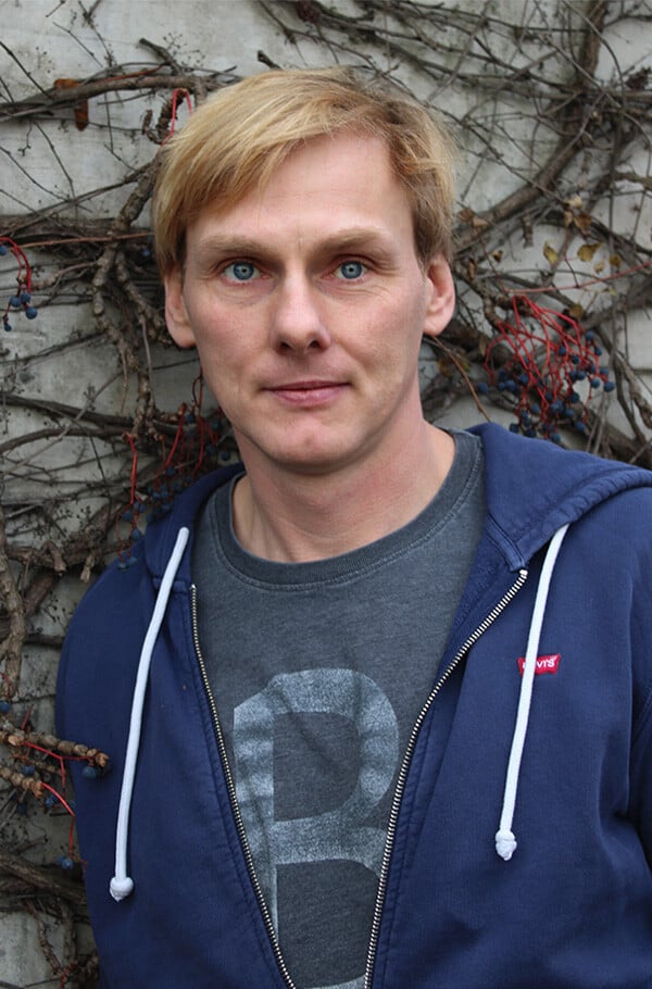 Portrait of Marcel Klinkosch in a black shirt